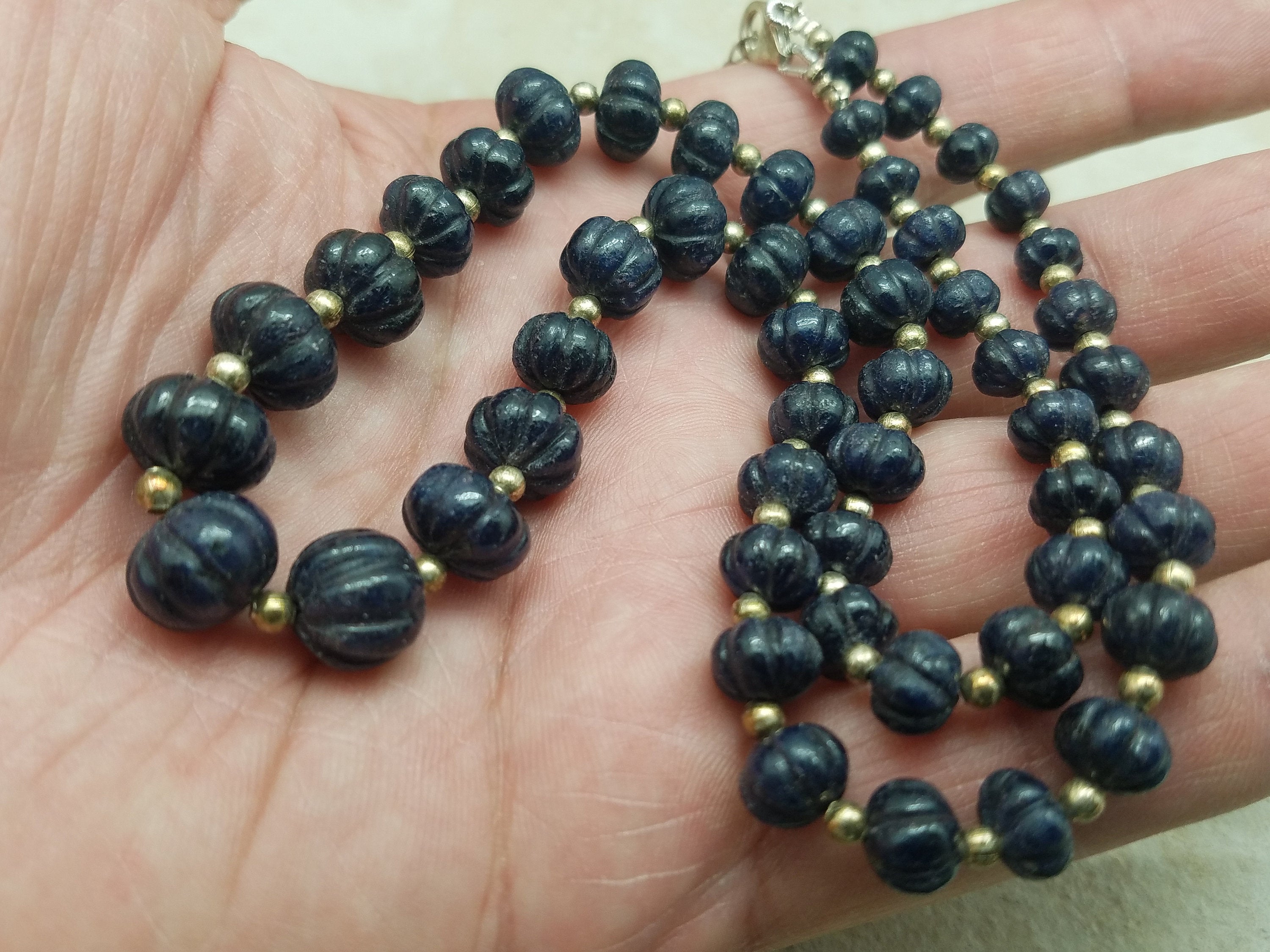 Graduated 7mm to 10mm Natural Blue Sapphire Carved Pumpkin Necklace with Sterling Silver Clasp, 20 inch